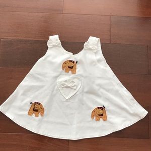 White dress with elephants. Size: 24 months.